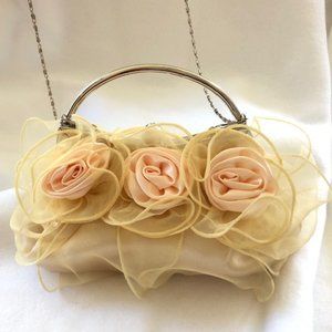 Darling feminine handbag satin and tulle accented with satin roses metal…